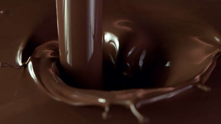 Closeup of splashing hot chocolate, freeze motionの写真素材