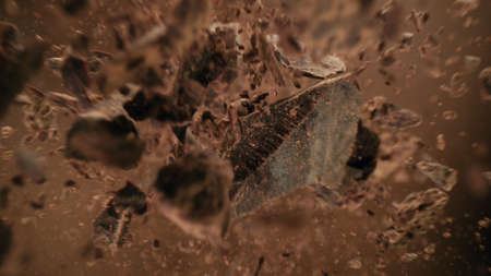 Rolling whole hazelnuts placed on wooden planks, freeze motion.の写真素材