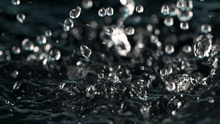 Texture of water waves, close-up. Dark colors design, abstract background.の写真素材