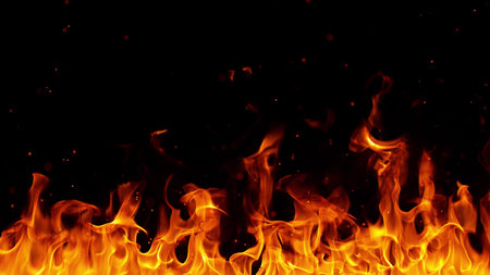 Texture of flames isolated on black background. Fire and fiery element.