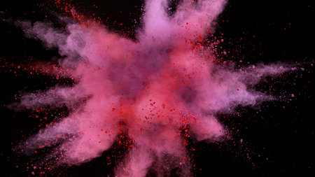 Freeze motion of coloured powder explosion. Isolated on black background, abstract shape.