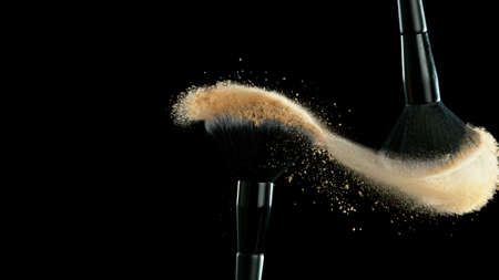 Macro photo of premium dark chocolate splashing. Freeze motion, splashing melted chocolate background.の写真素材