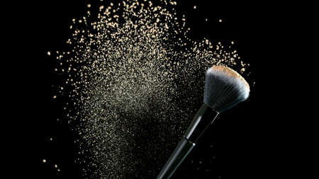 Macro photo of premium dark chocolate splashing. Freeze motion, splashing melted chocolate background.の写真素材