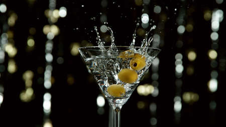 Champagne theme with bottle and glasses .. Studio shot, isolated on black background. Celebration and New Year concept.の写真素材