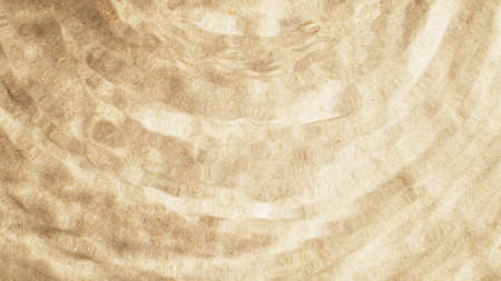Texture of sand with water waves. Abstract water surface, beach concept.の写真素材