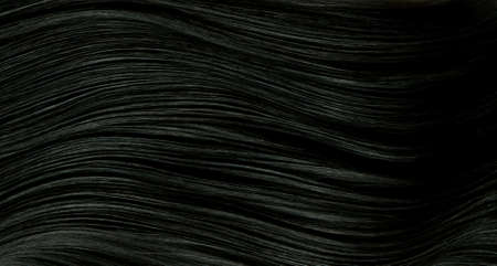 Closeup on luxurious straight and glossy black hair, abstract background.の写真素材