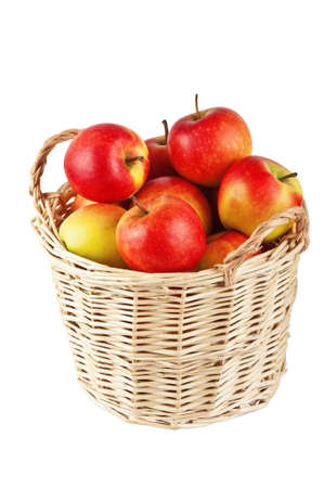 Apples in a basket on a white backgroundの写真素材