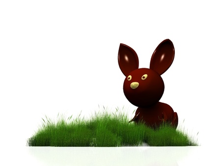 Chocolate Easter rabbit in grassの写真素材