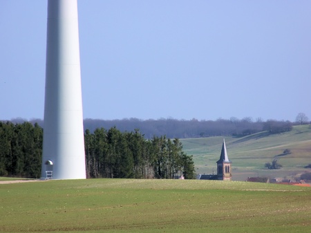 the mast of wind turbine  in a rural landscapeの写真素材