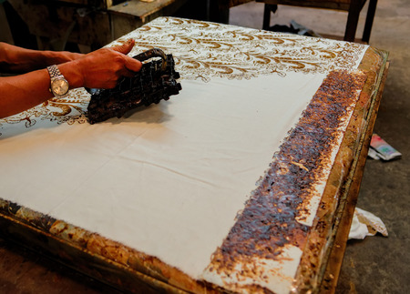 making a batikの写真素材