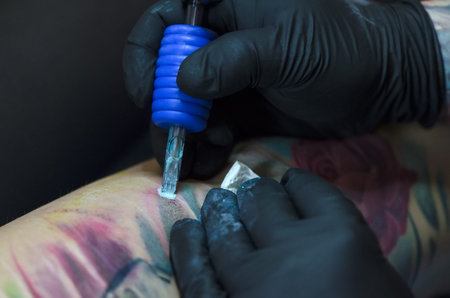 tattoo artist and tattoo
