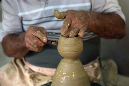 the potter and his turnの写真素材