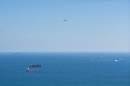 cargo ship and planeの写真素材