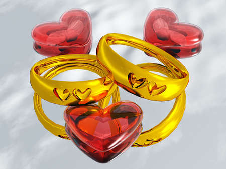 gold rings and heartsの写真素材
