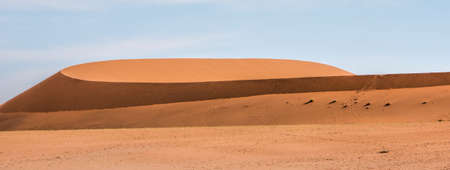 Red sand dunes in Namibiaの写真素材