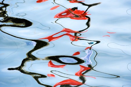 colorful reflections in the waterの写真素材