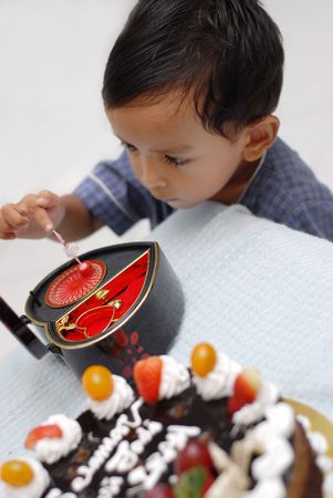 Little boy amazed with his birthday presentの写真素材