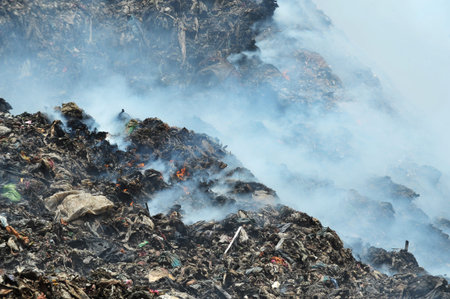 fire and smoke in a landfill