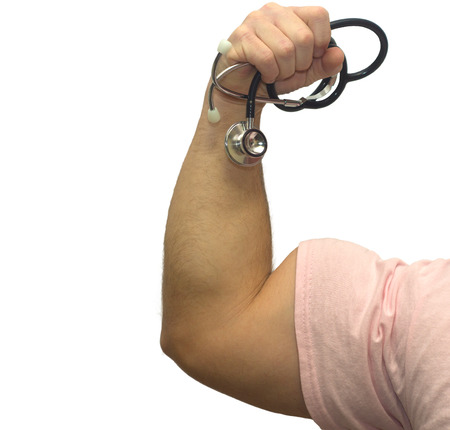 Strong Medicine - A man flexing his bicep while holding a stethoscope. Healthy living, medical vaccines, breast cancer awareness and many other health and medical concepts.の写真素材