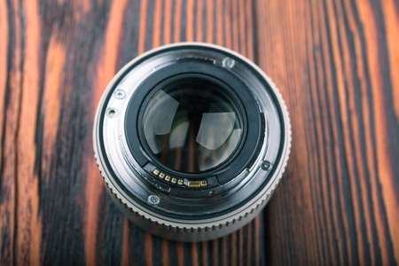 MOSCOW, RUSSIA, APRIL 21, 2017. CANON Extender EF 1.4 X II on a wooden backgroundのeditorial素材