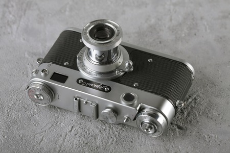 MOSCOW, RUSSIA, MAY 24, 2017. The old Soviet rangefinder camera Zorki-5, released 1958 on gray cement background.のeditorial素材