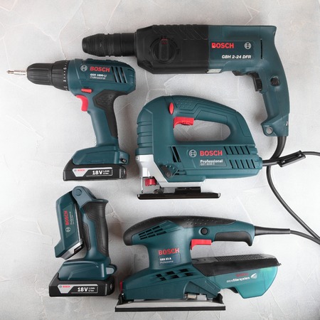 MOSCOW, RUSSIA, AUGUST 30, 2018. Power Tools Bosch Professional against the background of a plastered wall.のeditorial素材