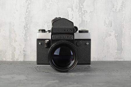 MOSCOW, RUSSIA, JULY 27, 2019. The old Soviet Medium format SLR Film camera Kiev-60, released1986 on gray cement background.のeditorial素材