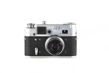 Very rare version of old Soviet rangefinder film camera FED-4, released1964 on white background.