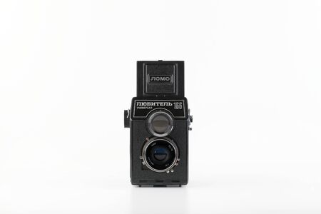 The old Soviet medium format film TLR camera Lubitel 166 Universal, released at the LOMO factory in 1986 on white background. Amateur.のeditorial素材
