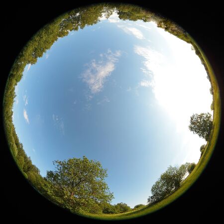 Around on Sky. Taken with a fisheye lens to give the special plate effect. The fresh air feel and clear blue sky are shown on the picture.の写真素材