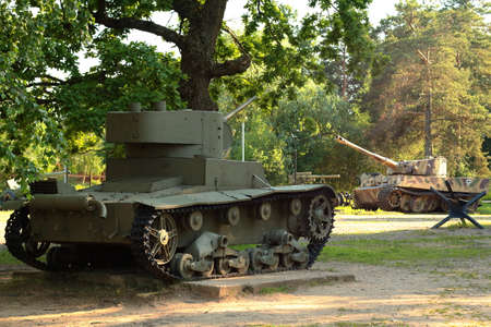 Snegiri village, Istra district, Moscow region, June 26, 2020. Light tank T-26 released in 1933, under the trees, participated in the 2nd world war.のeditorial素材