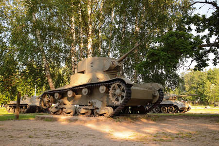 Snegiri village, Istra district, Moscow region, June 26, 2020. Light tank T-26 released in 1933, under the trees, participated in the 2nd world war.のeditorial素材