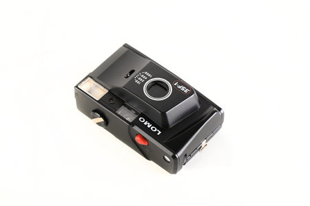 The very rare old Soviet automatic film camera LOMO 35F-1, released 1990 on white background.