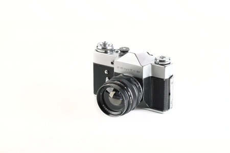 The old Soviet 35 mm SLR camera Zenit-B, released 1972 on white background.のeditorial素材