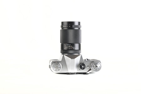 The old Soviet 35 mm SLR camera Zenit-B, released 1972 on white background.のeditorial素材