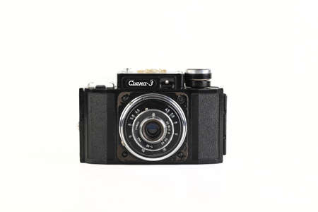 MOSCOW, RUSSIA, 09 FEBRUARY, 2021. The old Soviet 35mm. scaling film camera Smena 3, released 1959 on white background.のeditorial素材