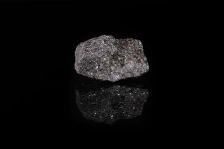 Mineral sphalerite, zinc blende from Zyrianovskoe, Altai, Russia on black glass background.の写真素材