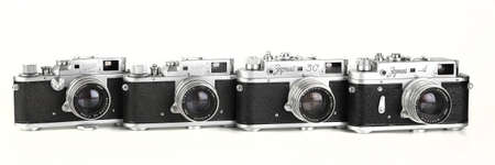 MOSCOW, RUSSIA, MAY 31, 2021. Evolution rare old Soviet rangefinder camera Zorki, Zorki-3, Zorki-3M, Zorki-3C, Zorki-4 produced from 1951 to 1956 on white background.のeditorial素材