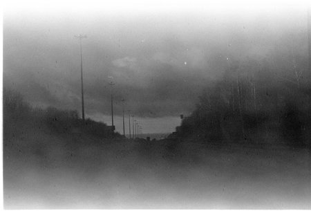 The scanned image taken with a film camera on an old film, tainted by dust and scratches. The image...