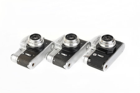 MOSCOW, RUSSIA, NOVEMBER 20, 2021. Very rare old Soviet 35 mm SLR cameras Zenit-3 and Zenit-3M, export version, released 1961, 1962, 1966 on white background.のeditorial素材