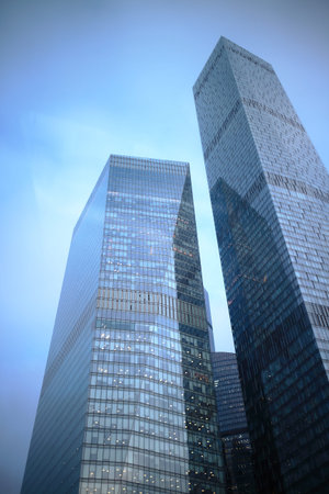 Looking at skyscrapers in the evening. Skyscrapers at dusk.