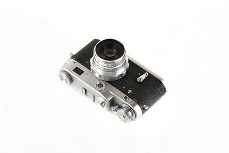 The old 35 mm film rangefinder camera on white background.の写真素材