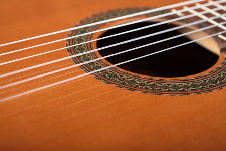 Mahogany classical guitar on vintage background.の写真素材