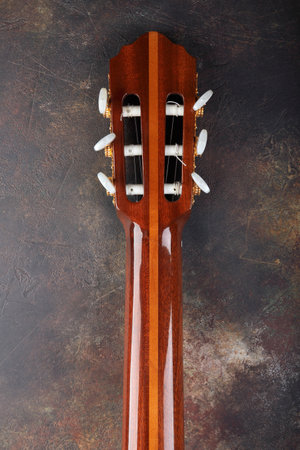 Mahogany classical guitar on vintage background.の写真素材