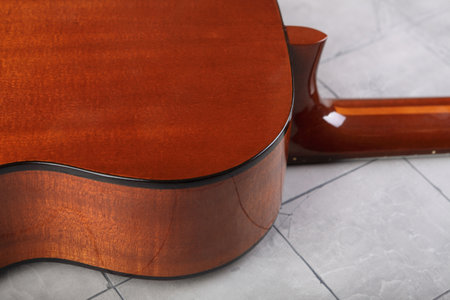 Mahogany classical guitar on vintage background.の写真素材