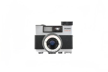 MOSCOW, RUSSIA, JULY 30, 2023. Old Soviet automatic film camera LOMO 135M, released 1982 on white background.のeditorial素材