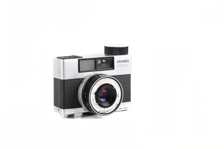 MOSCOW, RUSSIA, JULY 30, 2023. Old Soviet automatic film camera LOMO 135M, released 1982 on white background.のeditorial素材