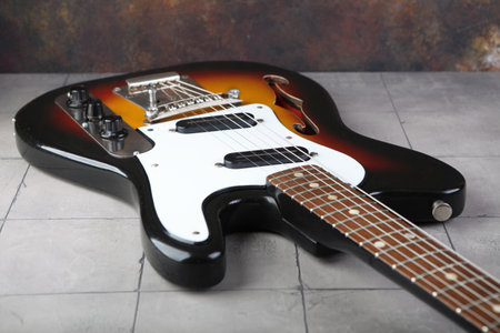 MOSCOW, RUSSIA, JULY 31, 2023. Vintage electric guitar Joana Iris released in 1988 on plastered background.のeditorial素材