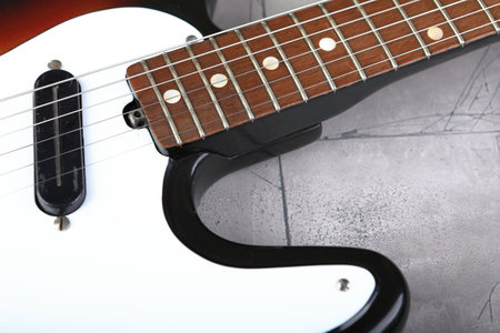 MOSCOW, RUSSIA, JULY 31, 2023. Vintage electric guitar Joana Iris released in 1988 on plastered background.のeditorial素材