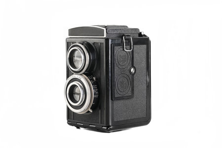 Vintage medium format film TLR camera, on white background. Film TLR camera. Lenses damaged by fungus.の写真素材